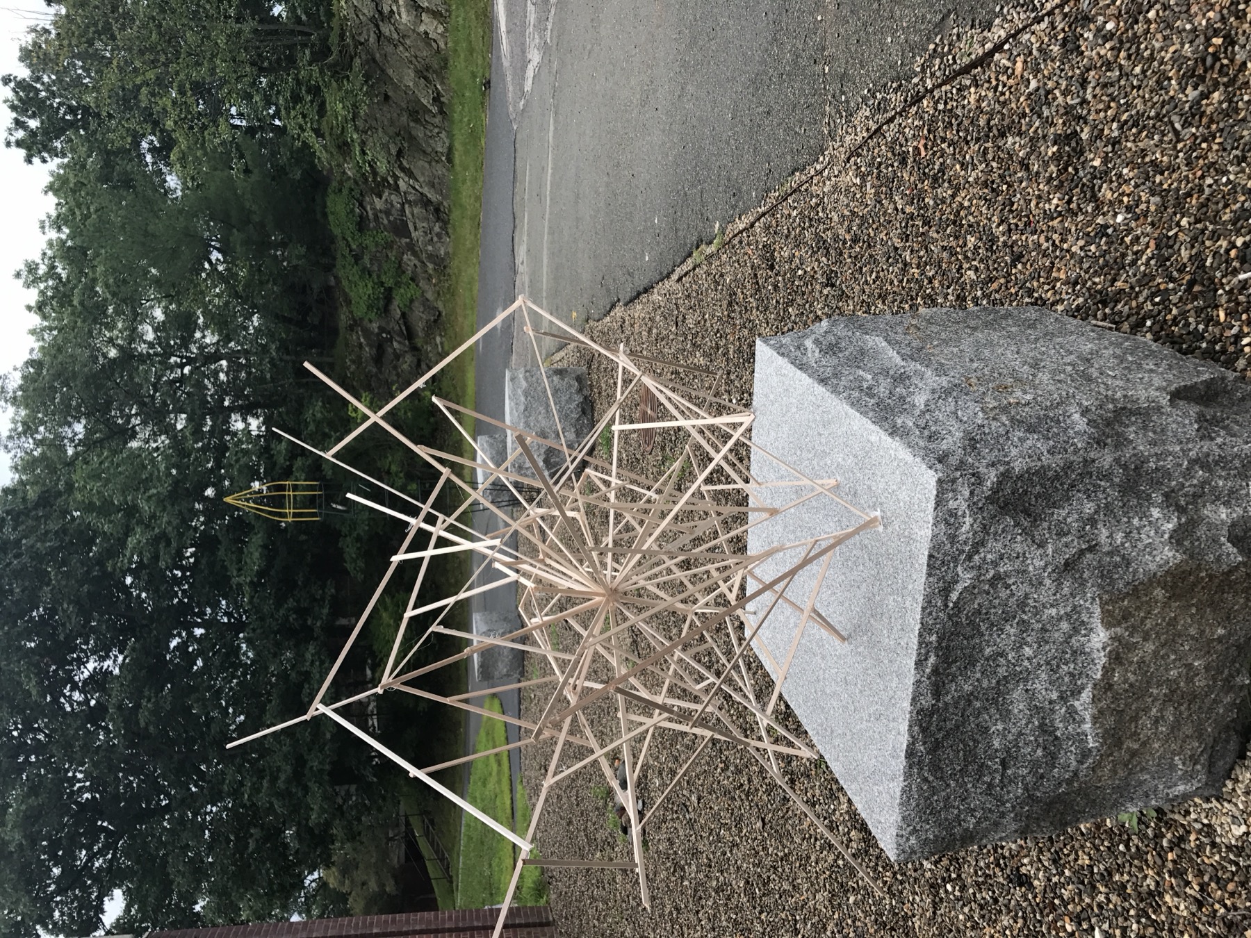 The original wooden sculpture on its granite plinth, 2017